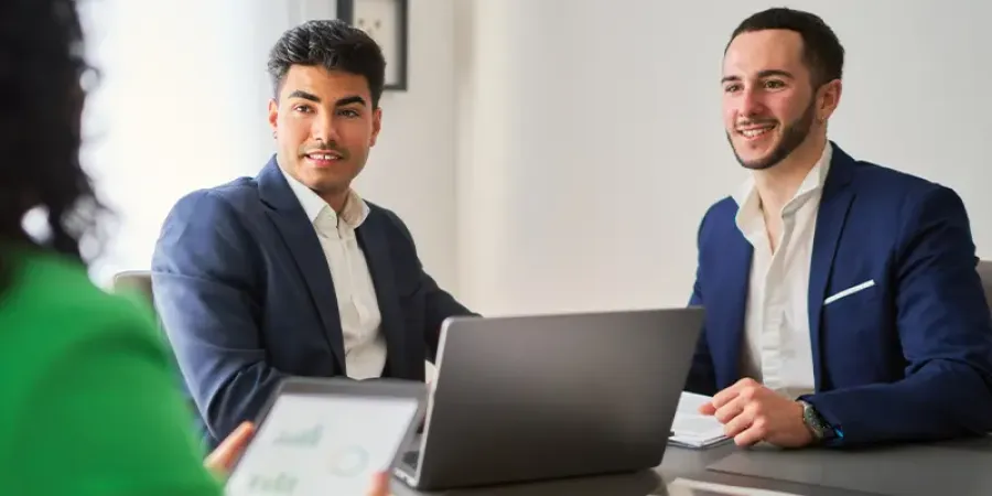 3 People shaking hands, agreeing on a finance contract